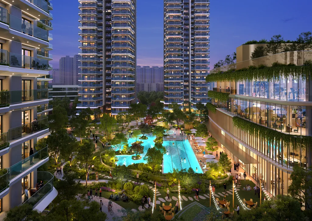 Evening view of the central pool and podium between the Eldeco 7 Peaks towers